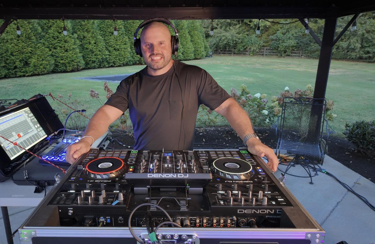 Luke Pritchard, owner of Pop Up Party 615, behind the DJ decks